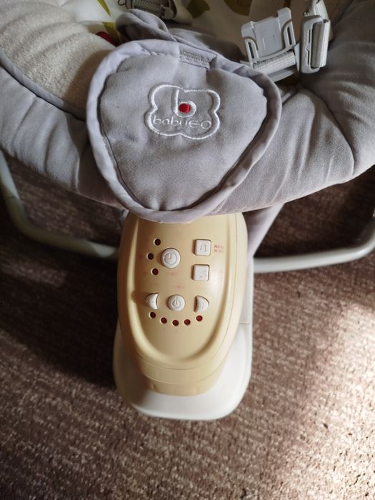 Заколисуючий центр гойдалка