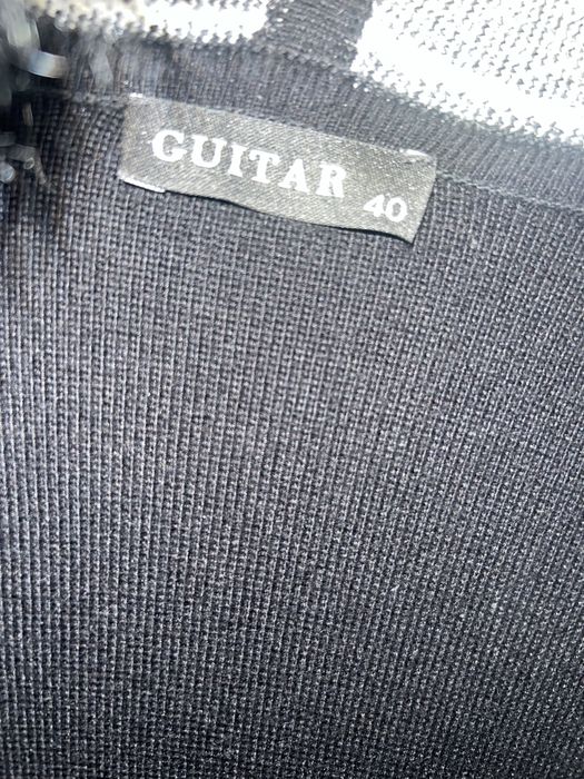 Кардіган з натуральним хутром.