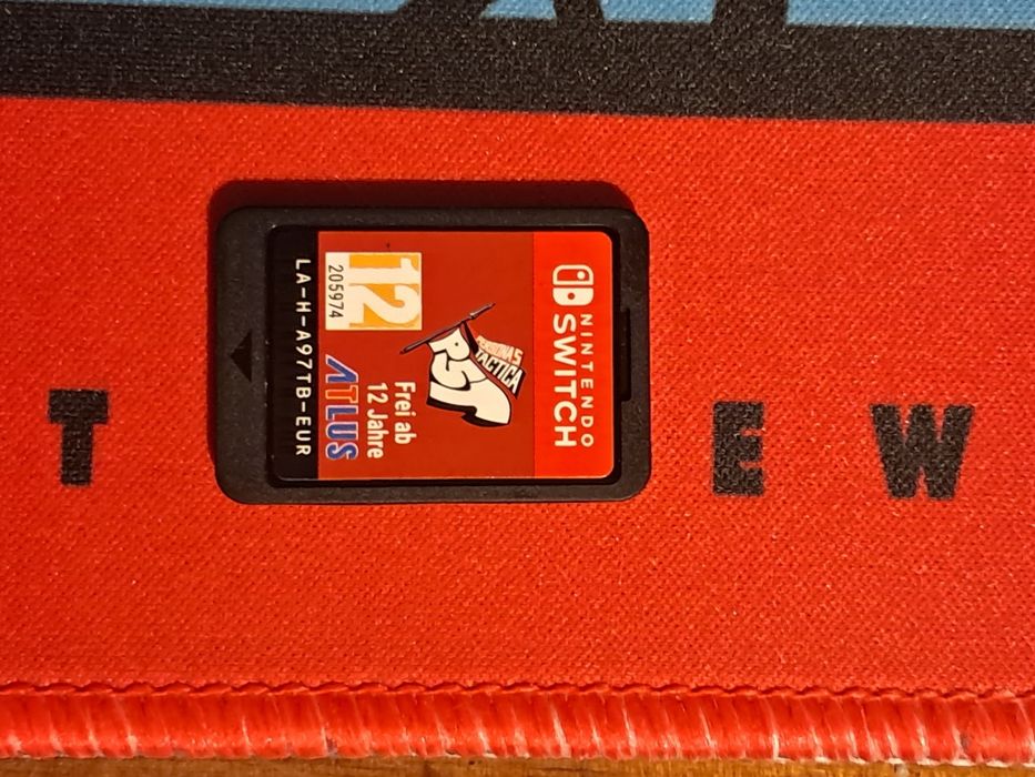 Nintendo Switch Lite + Extras