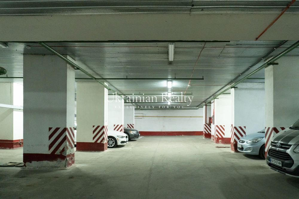 Продаж паркомісця в закритому паркінгу по вул. Кудрявська, 13–19