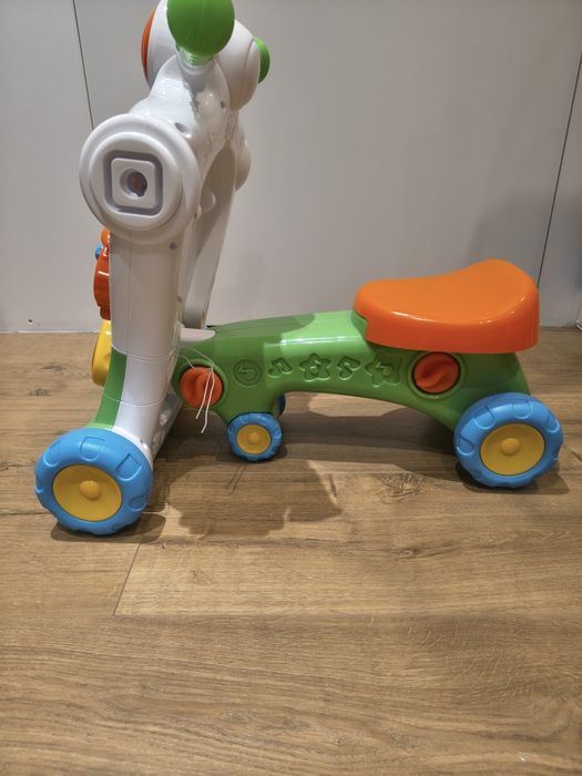 Muzyczny chodzik pchacz jeździk rowerek