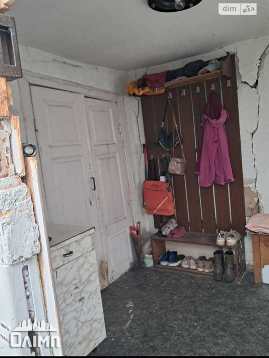 Продам пів будинку в топовом місці на вул.Кармелюка 0962