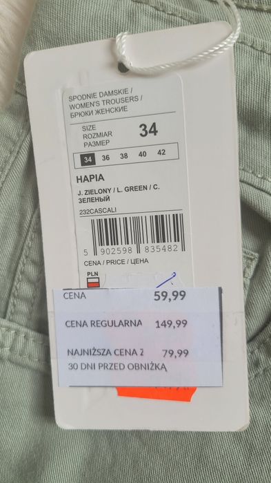 Nowe materiałowe spodnie z diverse r. 34