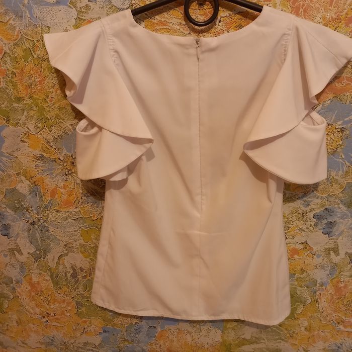 Три нарядных блузки.