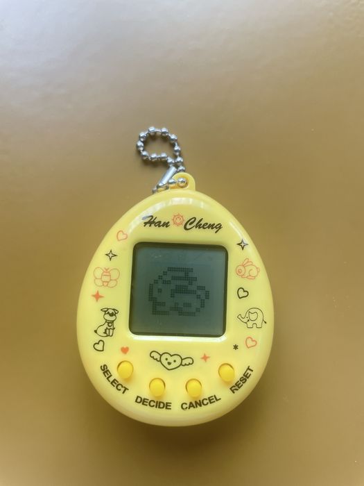 Bichinho Virtual Amarelo -  Estilo Tamagotchi