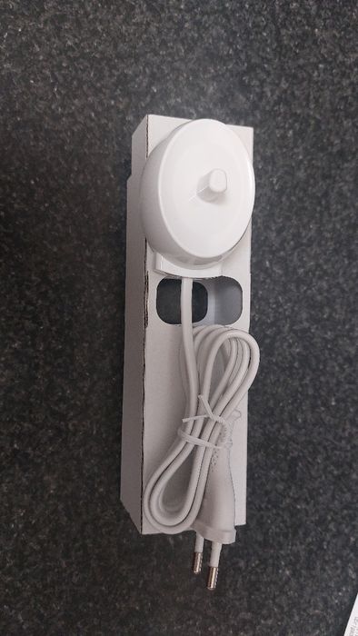 Carregador de escova elétrica  oral b - Novo