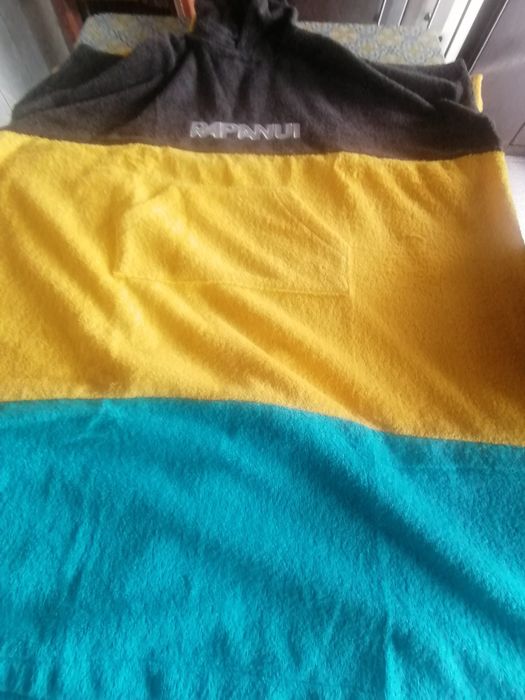 Ponchos para or ia banho