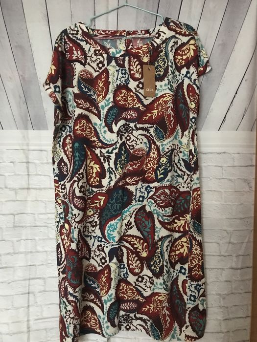 Жіноче плаття міді