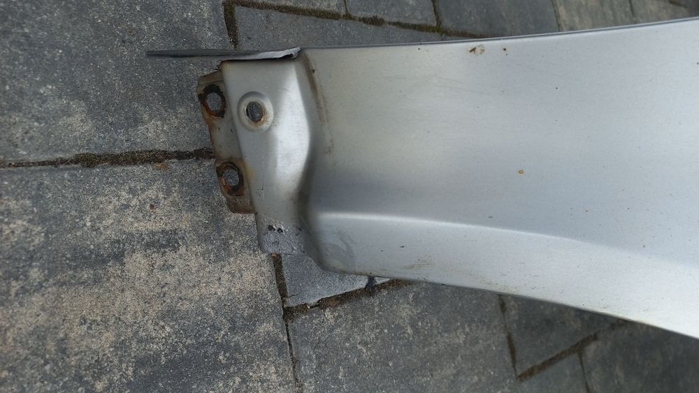 Vw passat b5 fl lift blotnik przedni prawy srebrny ly7w