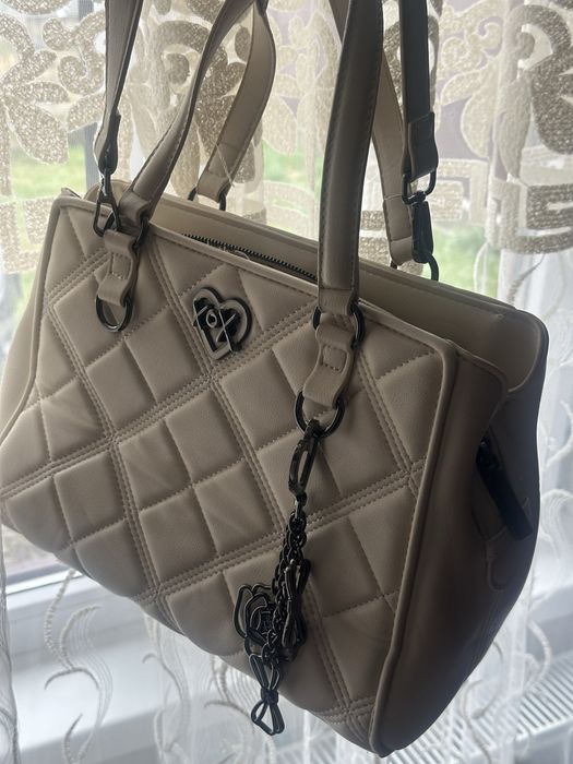 Сумочка з багатьма відділеннями.Нова!