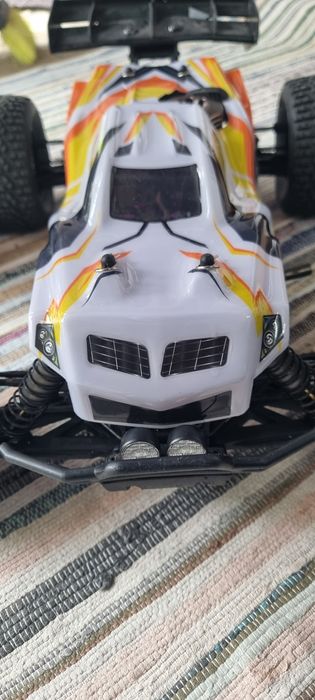 Vendo truggy 1/8 hpi hellfire  motor 4.6