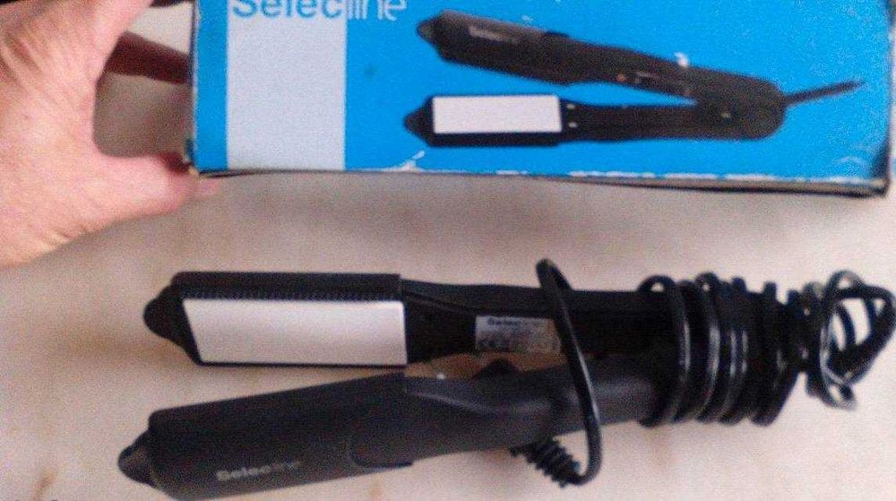 Alisador de cabelo como novo na caixa vendo ou troco