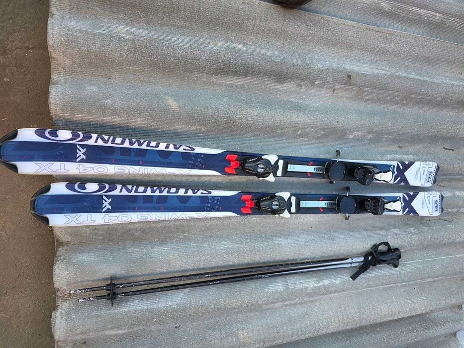 Комплект в упаковці: гірські лижі Salomon X-Wing 04 TX (145 см) + лижні палиці