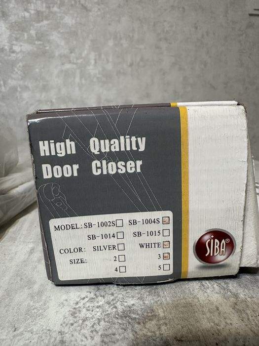 Доводчик для двері