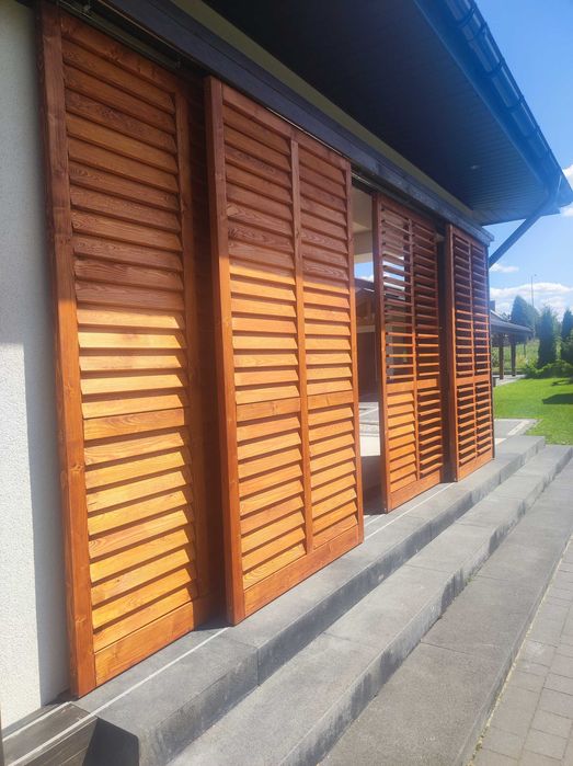 Żaluzje drewniane ruchome rolety tarasowe shuttersy