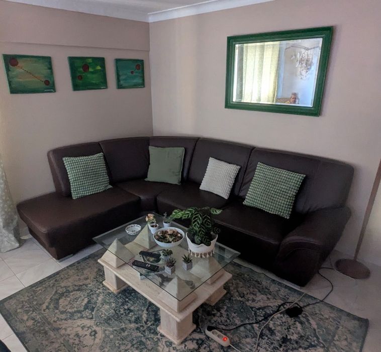 Sofá de canto em pele.