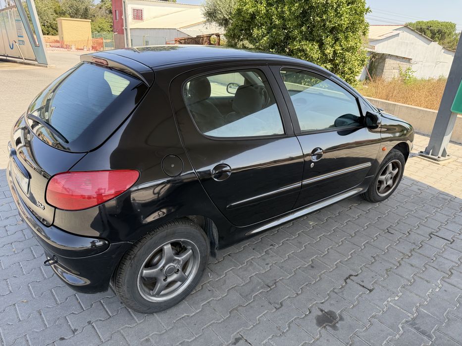 Peugeot 206 a gasolina com 152.000 foto 3