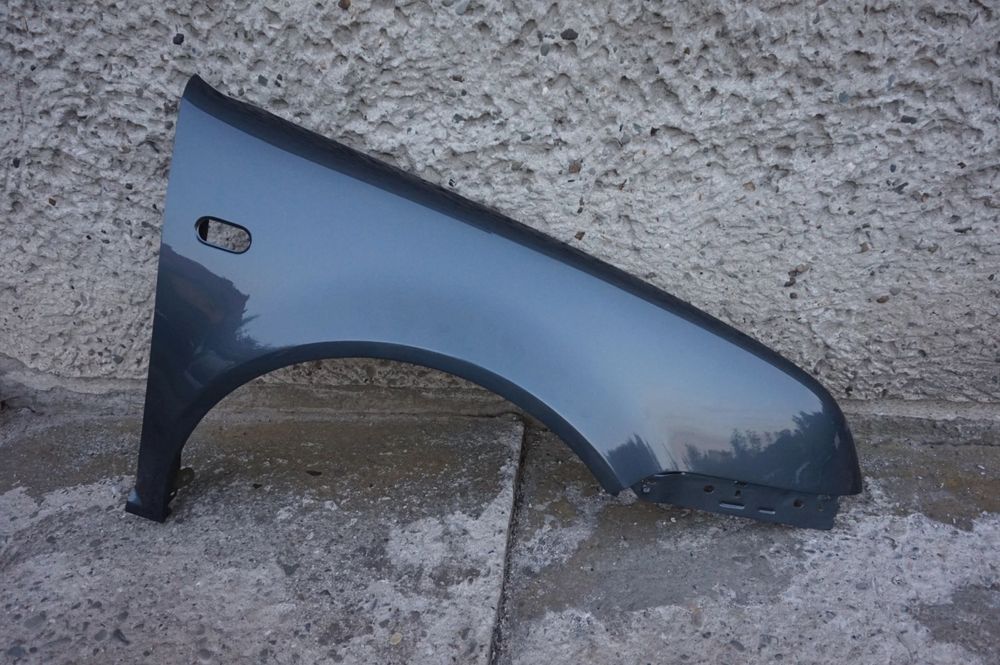 BŁOTNIK PRZEDNI PRAWY VW BORA LC7V