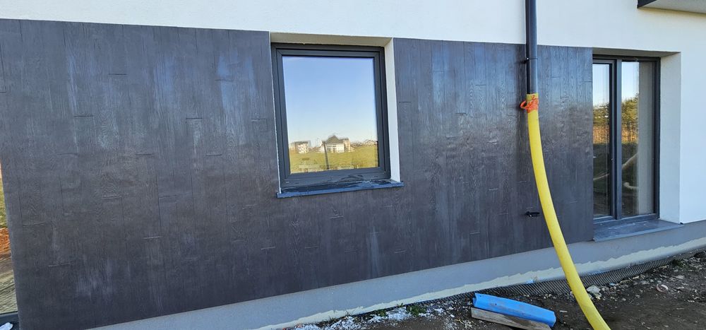 Domki jednorodzinne Klejenie styropianu, Tynk mozaikowy .