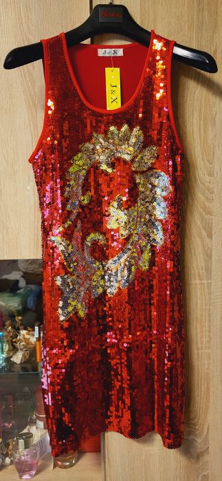 Sprzedam sukienke w cekiny.