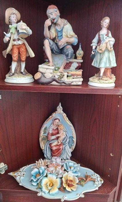 Estatuetas loiças decorativas