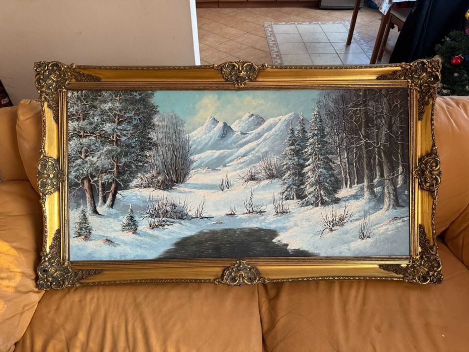 Obraz zimowy pejzaż w ozdobnej drewnianej ramie duży format