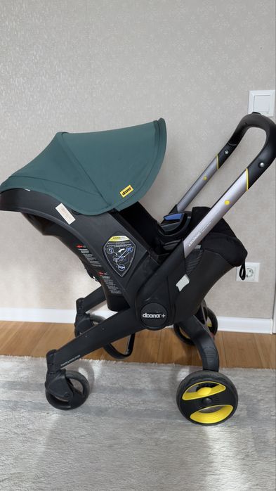 Doona +  автокрісло та база в комплекті