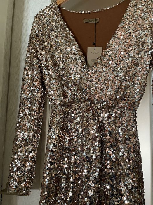 Vestido de lantejoulas dourado