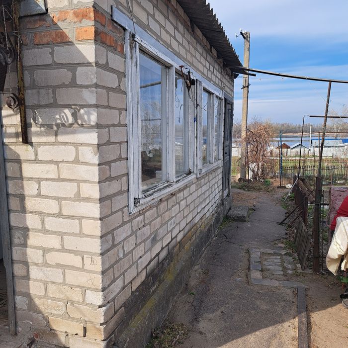 продам ділянку та півбудинку в районі Сухачівка