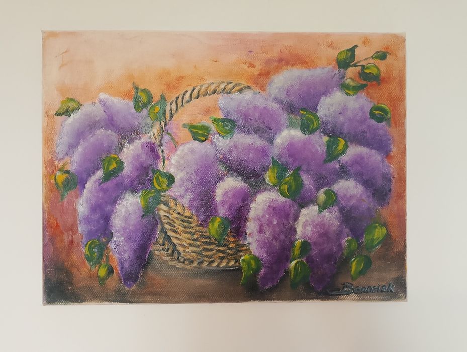 Obraz kwiaty bzu w wiklinowym koszu