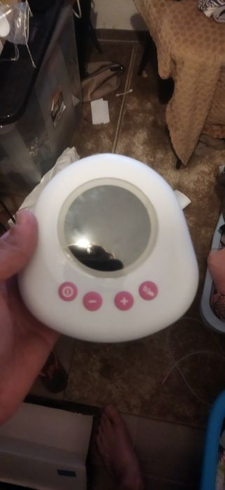 bomba de tirar leite elétrica quase nova