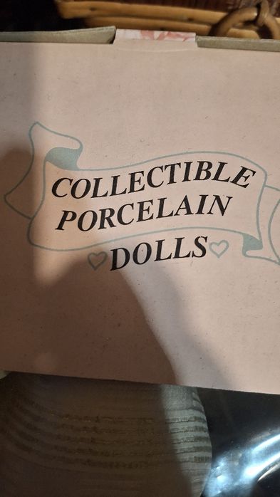 Boneca de coleção em Porcelana