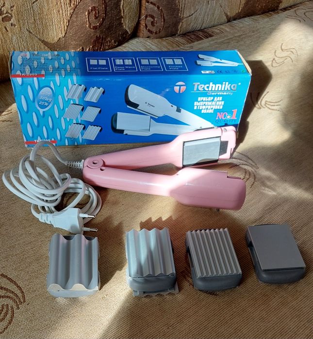 Прибор для выпрямления и гофрировки волос.