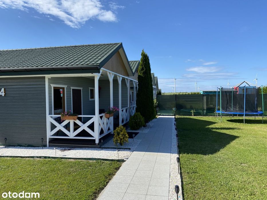 Sprzedam działkę z dwoma domkami drewnianymi