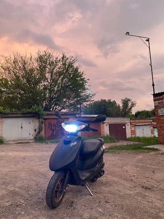 Мопед Yamaha.