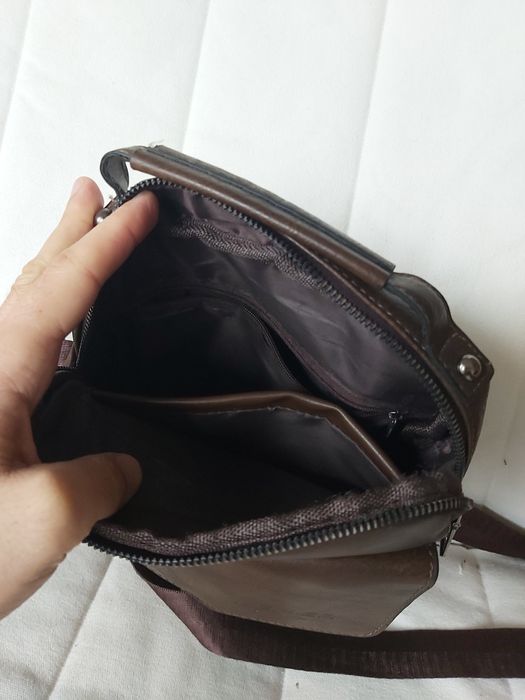 Bolsa de mão masculina