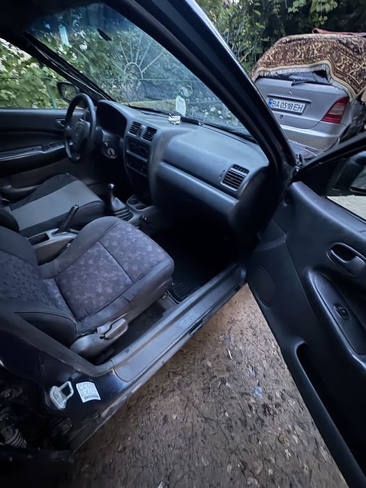Продам mazda 323