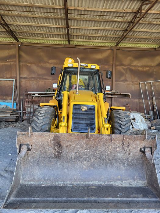 JCB-4CX екскаватор навантажувач