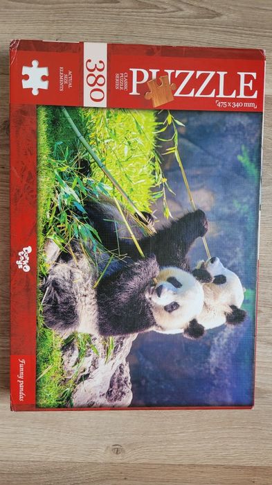 Пазл Danko Toys "Funny pandas" (Кумедні панди), який містить 380 елементів.