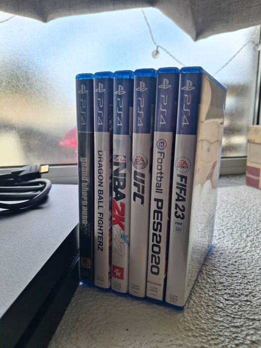 PS4 + Comando + 6 Jogos – Pronta a jogar