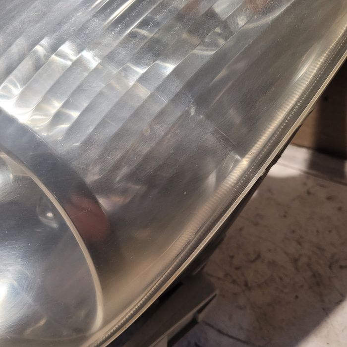 Lampa przód lewa Toyota Corolla Verso I E12 2003r oryginał