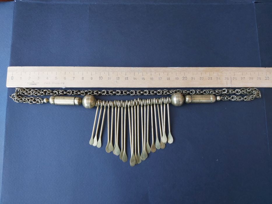 Украшение из латуни.