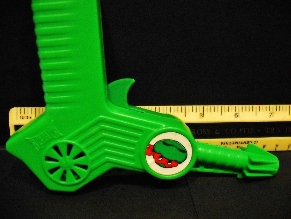 Pistola com dardos da tartaruga Ninja PEPE antiga