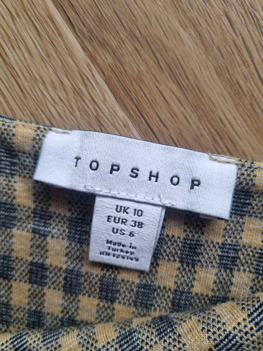 Krótka sukienka mini rozkloszowana w kratkę z paskiem dzianinowa