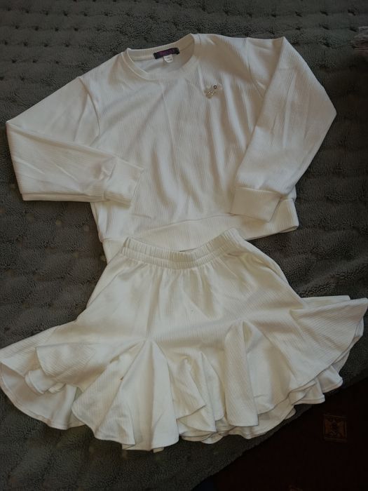 Костюми та плаття