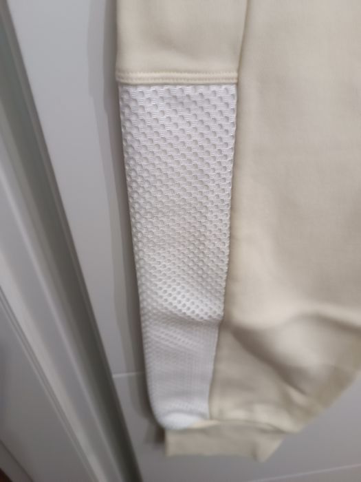 Oryginalne spodnie dresowe jasne Nike XL