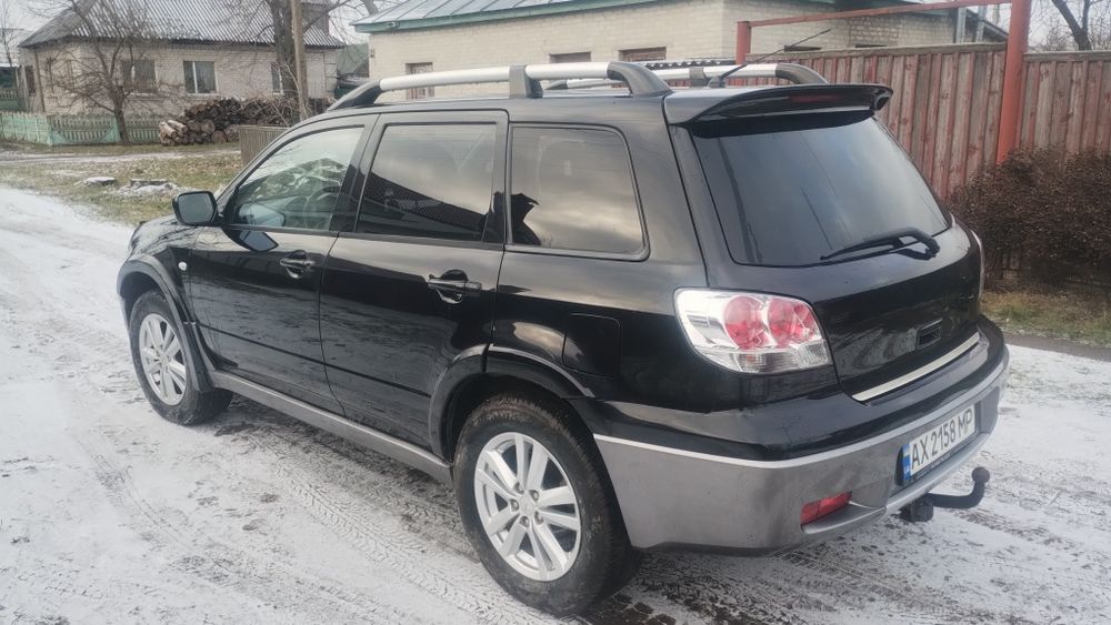 Аутлендер 2.4 бензин