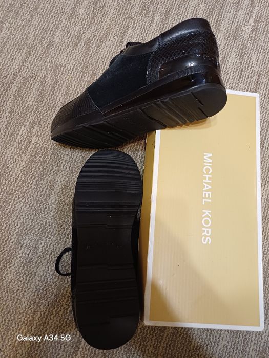 Продам кросівки шкіряні  Michael Kors  41 р.27 см