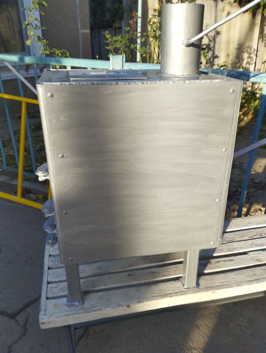 Печь буржуйка с варочной поверхностью.