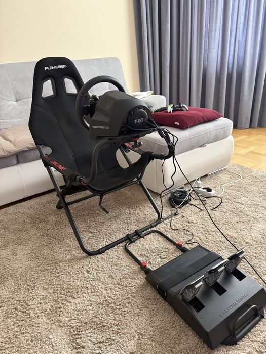 Ігрове кермо Thrustmaster T-GT2 i кокпіт Playseat Challange